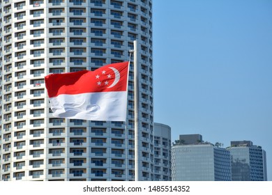 Singapore, Singapore - August 18 2019: The National Flag, Adopted In 1959 When Singapore Became Self-governing Within The British Empire, Reconfirmed On Independence On 9th August 1965 (National Day).