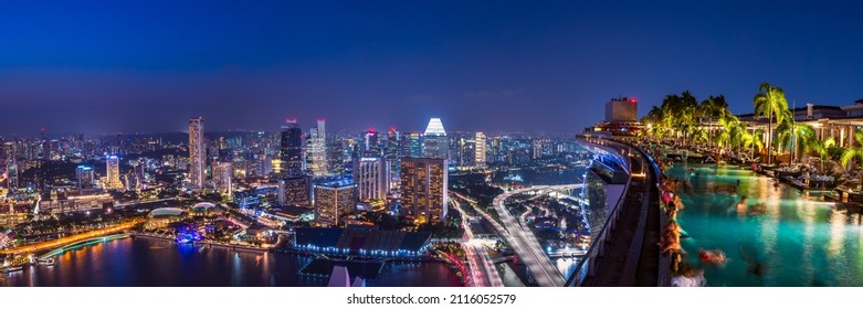 Singapore - August 2019: Banner Image Of Singapore Central Area Night View And Infinity Pool Side At MBS.