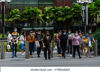 Singapore / August 3rd, 2020: Group Of People At Orchard Road Wearing Face  Masks 