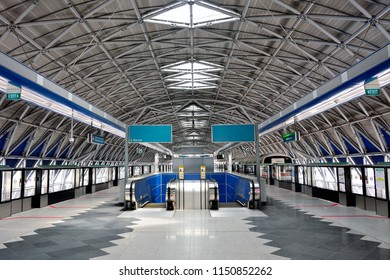 Singapore - August 6th 2018: View Of Modern Station Platform And Escalators At Gul Circle MRT Station On The East, West Singapore Train Line