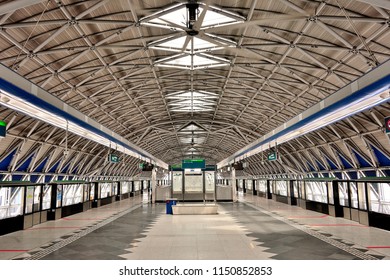 Singapore - August 6th 2018: View Of Modern Station Platform And Escalators At Gul Circle MRT Station On The East, West Singapore Train Line