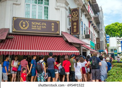 SINGAPORE - AUGUST 9: People waiting in front of famous Song Fa bak kut teh in Singapore on August 9, 2017