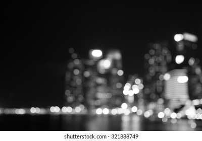 Singapore Building City Night Lights Bokeh And Reflect Of Marina Bay Blurred Black And White Background