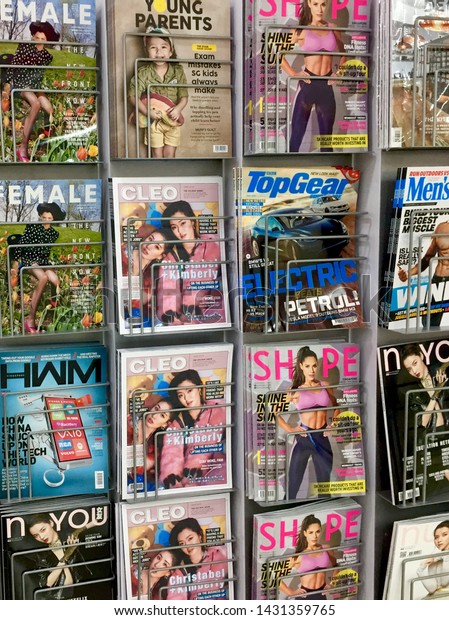 Singapore ,-Circa June 2019,- A collection of\
local and international magazine for selling at a local supermarket\
in Singapore.