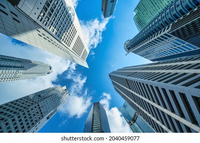 Singapore, city skyline looking up under skyscraper building business district - Powered by Shutterstock