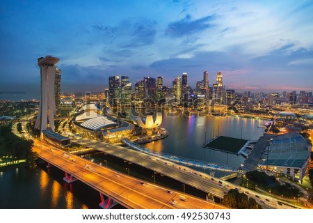 Singapore city skyline at Marina Bay view from Singapore Flyer at night