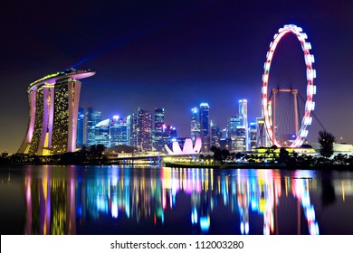 Singapore city skyline at night - Shutterstock ID 112003280