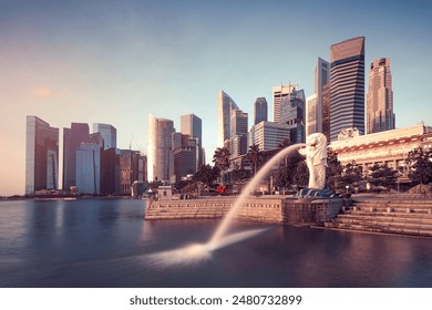 Singapore city, sunset and sunrise Downtown of Singapore is office buildings and business bank financial  - Powered by Shutterstock