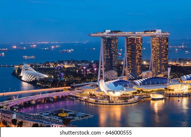 Singapore cityscape at dusk. Landscape of Singapore business building around Marina bay. Modern high building in business district area at twilight.