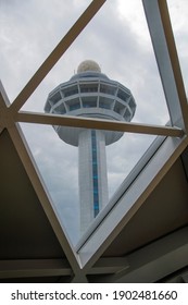 Singapore - Dec 31, 20120: Changi airport control tower view from the window of Jewel changi