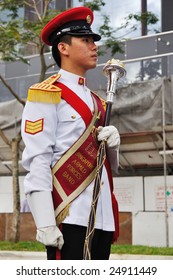 SINGAPORE - DECEMBER 07: Singapore Armed Forces Band B Drum Major Holding Mace During President's Changing-of-guards Parade December 07, 2008 In Singapore