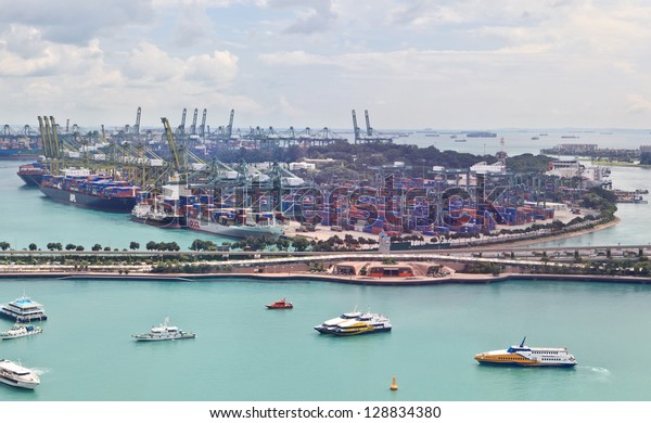SINGAPORE - DECEMBER 28: Singapore industrial\
port on December 28, 2012 in Singapore. It\'s world\'s busiest port\
in terms of total shipping tonnage, transfers fifth of the world\
shipping containers.