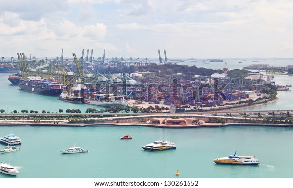 SINGAPORE - DECEMBER 28: Singapore industrial\
port on December 28, 2012 in Singapore. It\'s world\'s busiest port\
in terms of total shipping tonnage, transfers fifth of the world\
shipping containers.