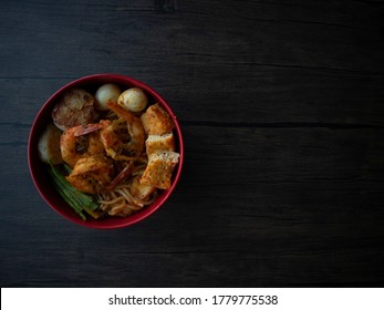 Singapore Dry Laksa Flatlay. Singapore Laksa Top Down Shot On Wooden Table With Copy Space. Dark Food Photography.