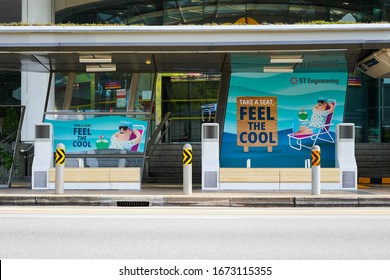 Singapore/ Singapore - February 13  2020: Bus Stop At Orchard Road With Benches With Fan. Outside Dhoby Ghaut MRT Interchange Station.
