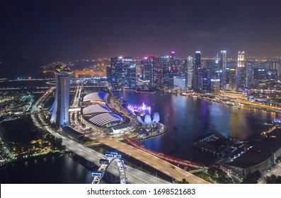 SINGAPORE - FEBRUARY 2: Aerial drone view of Singapore business district and city, Marina Bay is bay located in the Central Area of Singapore on February 2, 2020 in Singapore.