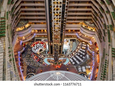 Singapore - February 20 2015: Looking Down From 20th Floor Of Marina Mandarin Hotel To 4th Floor, Housing The Reception And The Restaurants. Decorated For The 2015 Celebrations Of Lunar New Year