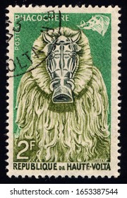 SINGAPORE – FEBRUARY 23, 2020: A Stamp Printed In Republic Of Upper Volta Shows Warthog, Circa 1960