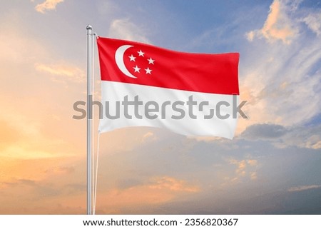 Singapore flag waving on sundown sky