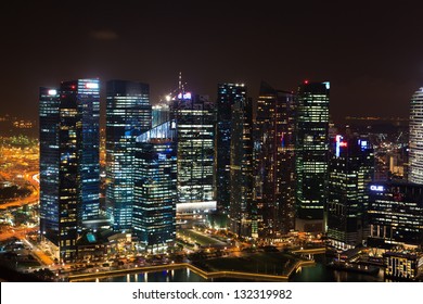 SINGAPORE - JAN 4: Marina Bay Financial District on Jan 4, 2013 in Singapore. Marina Bay is a bay near Central Area in the southern part of Singapore, and lies to the east of the Downtown Core. - Shutterstock ID 132319982