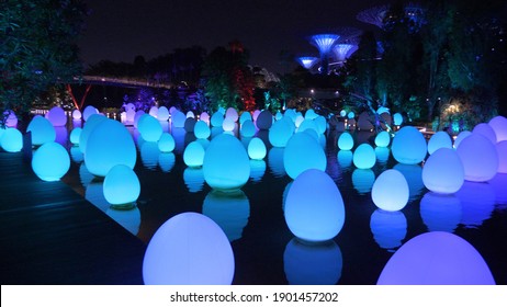 Singapore - January 15, 2020: Installation of luminous inflatable eggs in the famous touristic spot Gardens by the Bay. It is a nature park spanning 101 hectares in the Central Region of Singapore