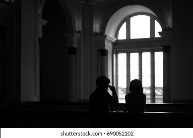 SINGAPORE, JANUARY 2016: A Couple Deep In Conversation At The National Gallery Of Singapore