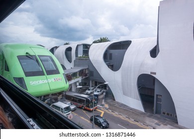 Singapore, Singapore - January 22, 2017: A tourist train carries passengers to Sentosa Island from Futuristic Harbourfront Mall.