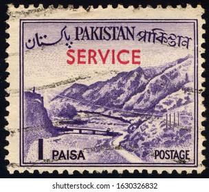 SINGAPORE – JANUARY 30, 2020: A stamp printed in Pakistan shows image of The Khyber Pass - a mountain pass connecting the town of Landi Kotal and Pakistan border, circa 1961