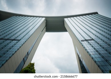 SINGAPORE, SINGAPORE - Jul 04, 2015: A Low Angle Symmetric Shot Of Marina Bay Sands Building In Singapore During The Daytime