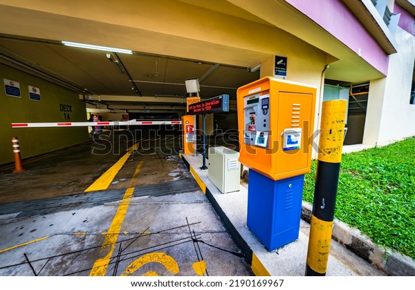 Singapore - Jul 16,\
2022 : Fully automated car park entrance at HDB apartments in\
Yishun town,\
Singapore.