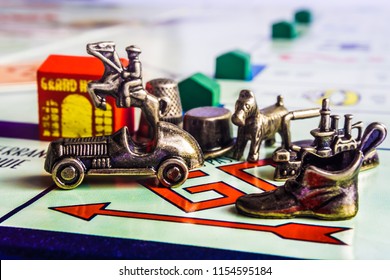 Singapore - Jul 24, 2018:  Monopoly Board Game Close Up With Tokens Waiting To Start At GO Box. The Classic Real Estate Trading Game From Parker Brothers Was First Introduced To America In 1935.