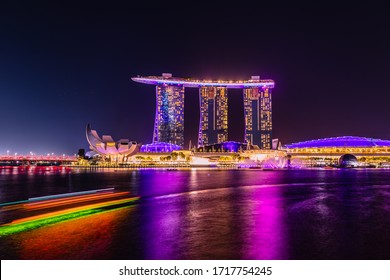 Singapore - July 1, 2019 - Iconic Hotel Marina Bay Sands, Art Science Museum night panorama