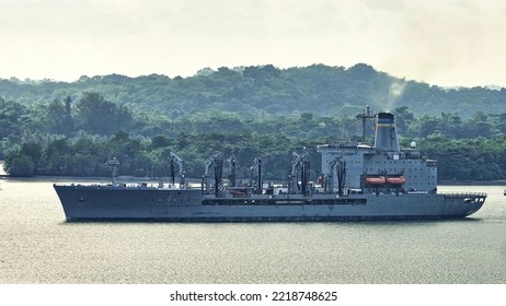 SINGAPORE - JULY 18, 2022: USNS Tippecanoe (T-AO-199) , A Henry J Kaiser-class Replenishment Oiler Transit The Straits Of Johor.