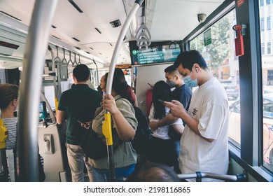 SINGAPORE - JULY 27, 2022 : Passenger Using Phone Inside The City Bus Singapore. Public Transport In The City Singapore.