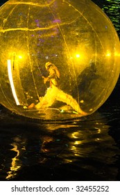 SINGAPORE - JUNE 19: Dance Performance In Giant Plastic Bubble Floating On River Surface At The Singapore River Festival Held On 19 Jun 2009, In Singapore.