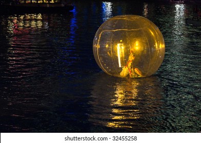 SINGAPORE - JUNE 19: Dance Performance In Giant Plastic Bubble Floating On River At The Singapore River Festival Held On 19 Jun 2009, In Singapore.