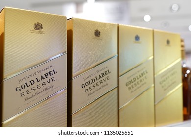 SINGAPORE - JUNE 20, 2018 : Johnnie Walker Gold Label blended whisky display on store shelf in Changi Airport. Johnnie Walker was established in 1820 in Kilmarnock, Scotland. - Shutterstock ID 1135025651