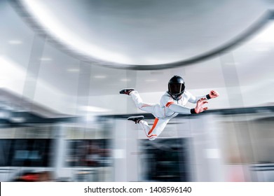 Singapore Levitation Man In Wind Tunnel. Indoor Sky Diving. Team Flyers. Yoga Fly In Wind Tunnel. Indoor Skydiving. 
