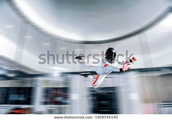 Singapore\
Levitation man in wind tunnel. Indoor sky diving. Team flyers. Yoga\
fly in wind tunnel. Indoor skydiving.\
\
