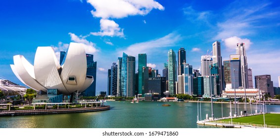 SINGAPORE - MAR 1, 2020: Singapore downtown waterfront with ArtScience Museum seen from Helix Bridge