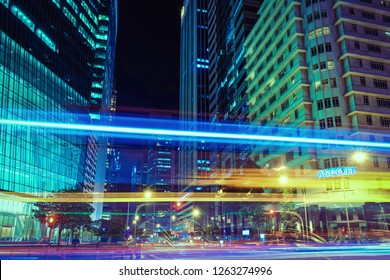 Singapore, Singapore - March 1, 2016: Raffles Quay Street And Singapore Stock Exchange Building, At Night In Singapore