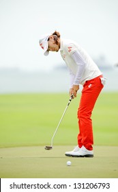 SINGAPORE - MARCH 3: Korean Na Yeon Choi Putting At The Green During HSBC Women's Champions At Sentosa Golf Club Serapong Course March 3, 2013 In Singapore