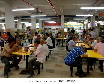 Singapore, March 8, 2016: Many People In A Typical Singapore Food Court Or Hawker