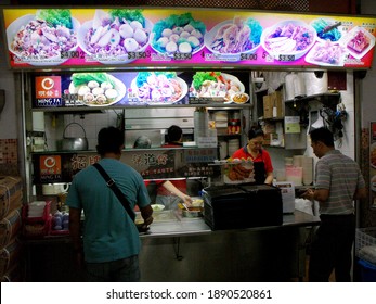 Singapore, March 8, 2016: Small Restaurant In A Typical Singapore Food Court Or Hawker