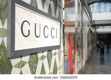 Singapore Marina Bar 12 June 2022. Gucci Sign On A Marble Wall.