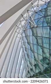 Singapore - May 12 2022: Detail Exterior Of Cloud Forest And Flower Dome At Gardens By The Bay. Glass Window With Sunlight Reflection And Clear Blue Orange Sunset Sky Background. No People