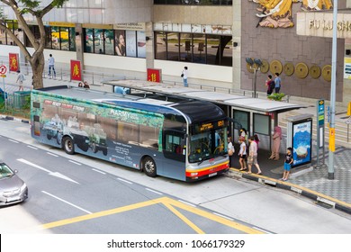 SINGAPORE, MAY 14, 2017 : The City Bus Arrives At The Station In Bugis, Singapore City. Public Transport In The City Singapore.