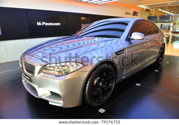 SINGAPORE - MAY 21: Unveiling the new BMW M5
Concept at Munich Automobiles BMW Service Centre Open House on May
21, 2011 in Singapore