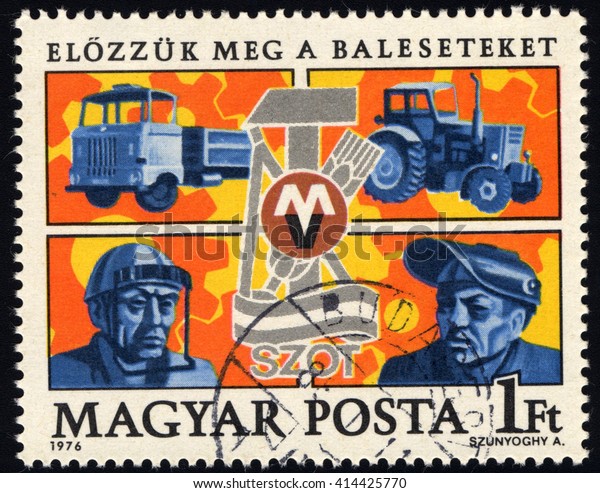 SINGAPORE â??\
MAY 3, 2016: A stamp printed by Hungary, shows Trucks, Safety\
Devices, Trade Union emblem, circa 1976\
