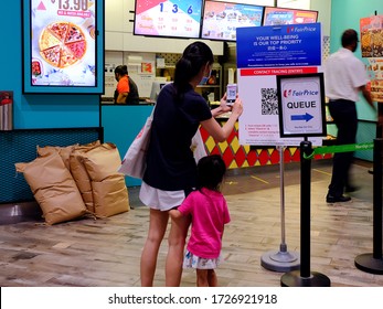 Singapore May2020 NTUC Fairprice Supermarket. Enhanced Contact Tracing At Entrance (circuit Breaker Measures); QR Code Scan Via SingPass Mobile, A Government-developed Cloud-based Check-in System